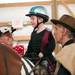 (left) David Jessen, Ann Arbor, smiles at Jansen Sweeny, 6 of Belleville, at the Harold and Kay Peplau Therapeutic Riding Center's Halloween Trick-or-Treat horse ride. (Tanya Moutzalias for AnnArbor.com)